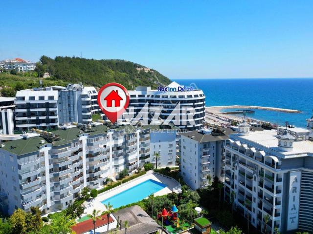 Alanya Konaklı'da Denize Sıfır 2+1 Eşyalı Satılık Daire