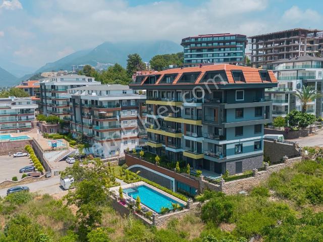 Alanya Kestel 2+1 Sıfır Eşyalı 85m2 Deniz Manzaralı Lüks Sitedee