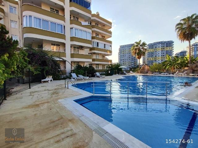 Alanya Mahmutlar önü komple açık havuz ve deniz manzaralı satılık 2+1 daire