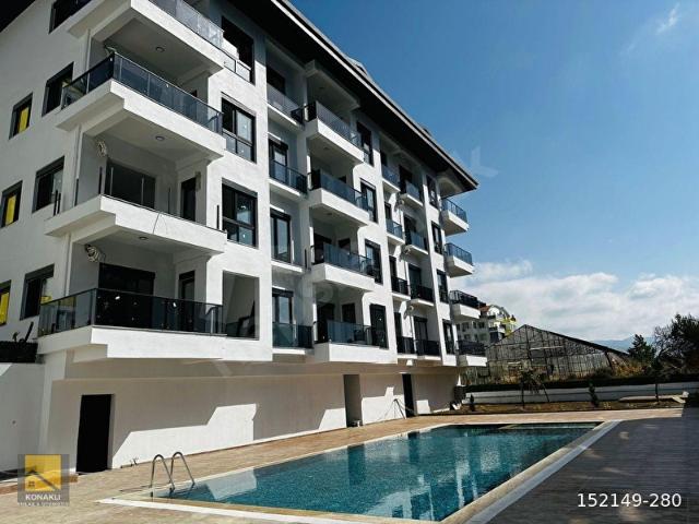 ALANYA PAYALLAR SATILIK 2+1 AMERİKAN MUTFAK İSKANLI AKTİVİTELİ DAİRE