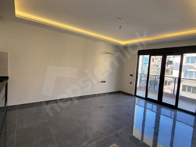 ALANYAMAHMUTLAR SATILIK 1+1 DAİRE DENİZE 150 MT