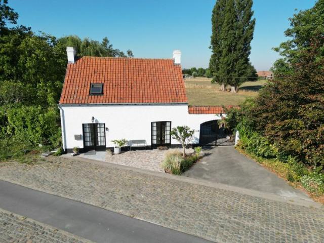 Alleenstaande woning met 3 slaapkamers en garage te Beerst