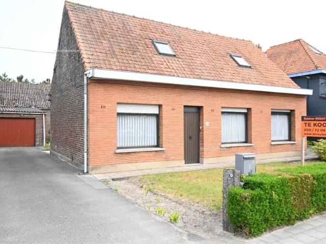 Alleenstaande woning met garage en tuin
