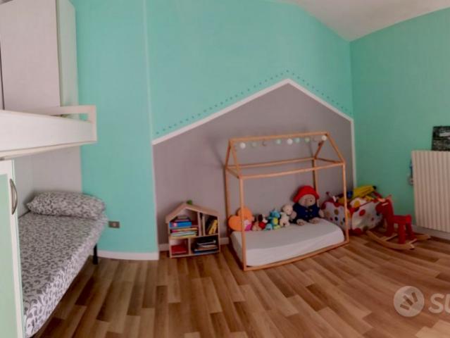 Ampio attico vista mare