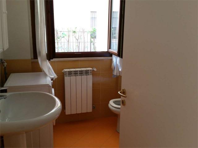 ampio bilocale con giardino privato