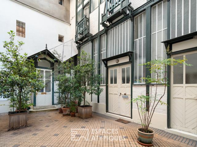 Ancien atelier d'artiste aménagé en duplex Plaine Monceau
