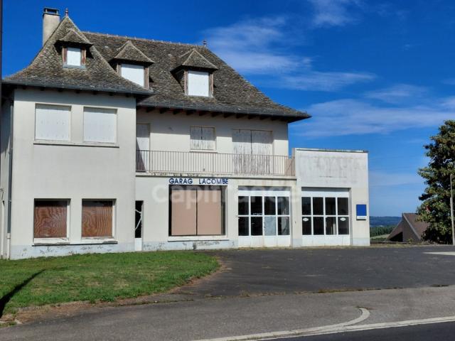 Apparttement 120 m2 ancien garage automobile avec fort potentiel de réhabilitation à MONTSALVY 15