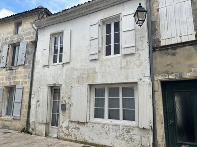 Ancienne boutique devenue pied à terre
