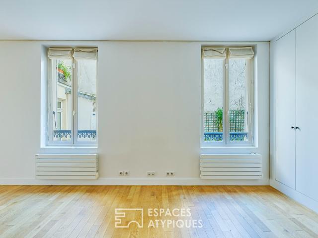 Ancienne boutique réhabilitée en appartement au coeur de Montmartre