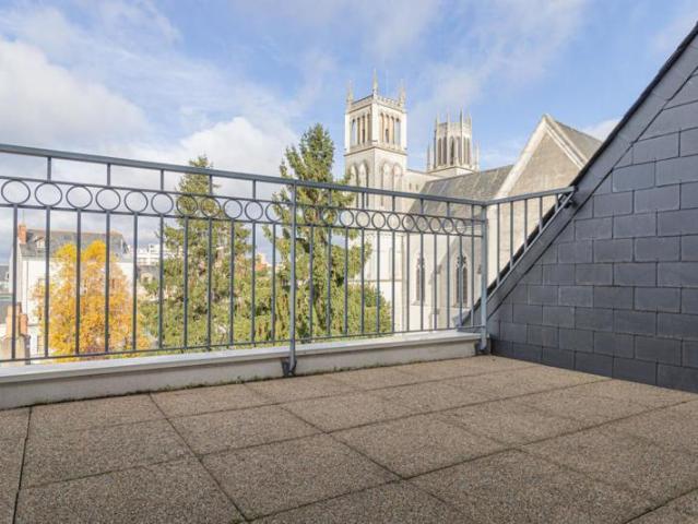 Angers / Hyper centre / Dernier étage / Appartement T4 de 91 m² avec deux terrasses, garage et cave