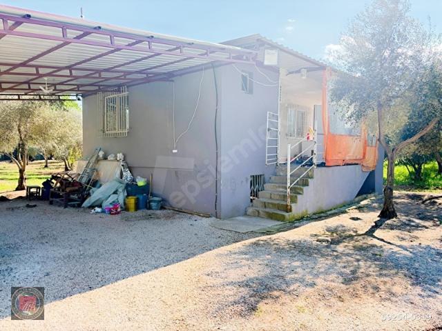 ANTALYA DÖŞEMEALTI KARAVELİLERDE İÇERİSİNDE EV OLAN BAHÇE