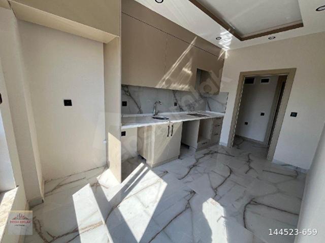 ANTALYA DÖŞEMEALTI YEŞİLBAYIRDA SATILIK 2+1 SİTE İÇERİSİNDE HAVUZLU İSKANI ALINMIŞ OTURMAYA HAZIR