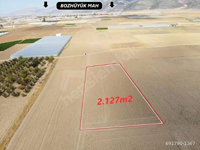 ANTALYA ELMALI BOZHÜYÜK MAHALLE MERKEZİNE YAKIN LOKASYONDA 2.127m2 SATILIK TARLA