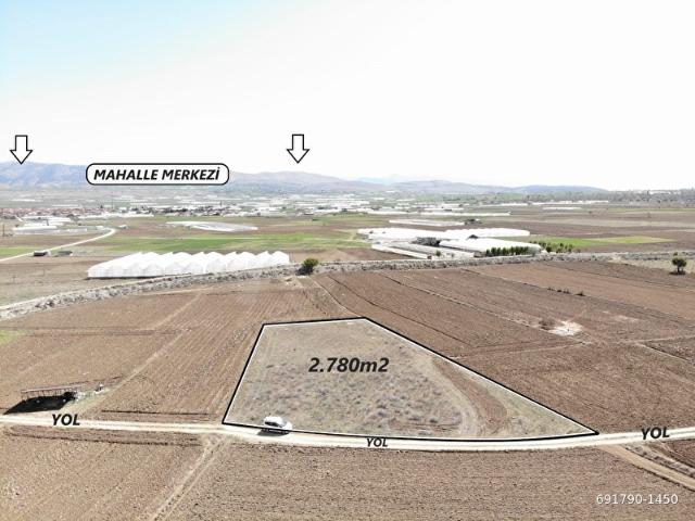 ANTALYA ELMALI BOZHÜYÜK MAHALLESİNDE KADASTROL YOLA CEPHE 2.780m2 SATILIK BOŞ TARLA
