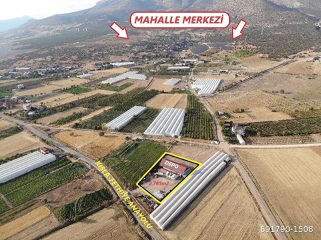 ANTALYA ELMALI İLÇESİNDE KIŞLAFETHİYE ANAYOLUNA CEPHE 2.763m2 TİCARİ İMARLI SATILIK DEPO VE EV