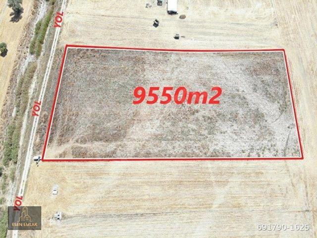 ANTALYA ELMALI KARAMIK MAHALLESİNDE YOLA CEPHE 9.550m2 SATILIK BOŞ TARLA