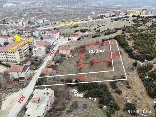 ANTALYA ELMALI MERKEZDE FEN LİSESİ ARKASI 3 KATA İMARLI 9 DAİRE PLANI OTURAN 1223m2 SATILIK ARSA
