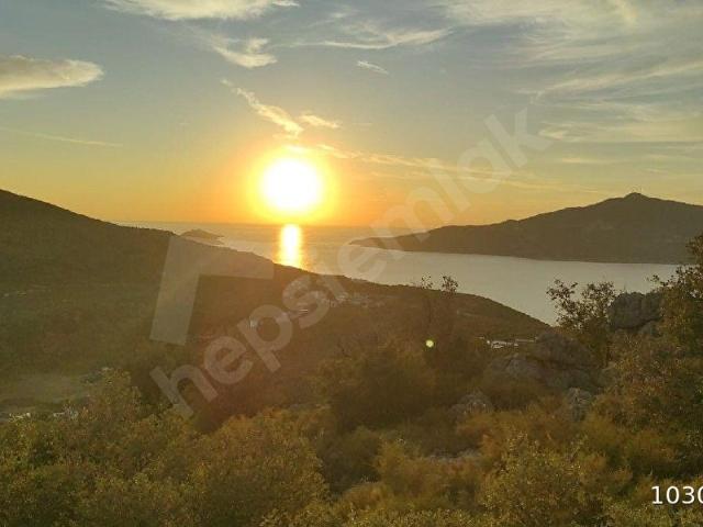 ANTALYA KAŞ BEZİRGAN'DA DENİZ MANZARALI,VİLLA BÖLGESİNDE YATIRIMLIK SATILIK ARSA.