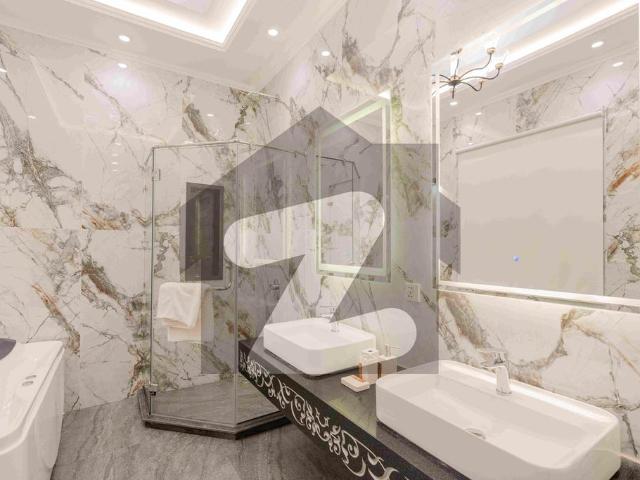 Anw real estate proudly offers: 1 kanal elegant and fully maintained super hot located bungalow is available in the best block of dha phase 8 lahore. DHA Phase 8