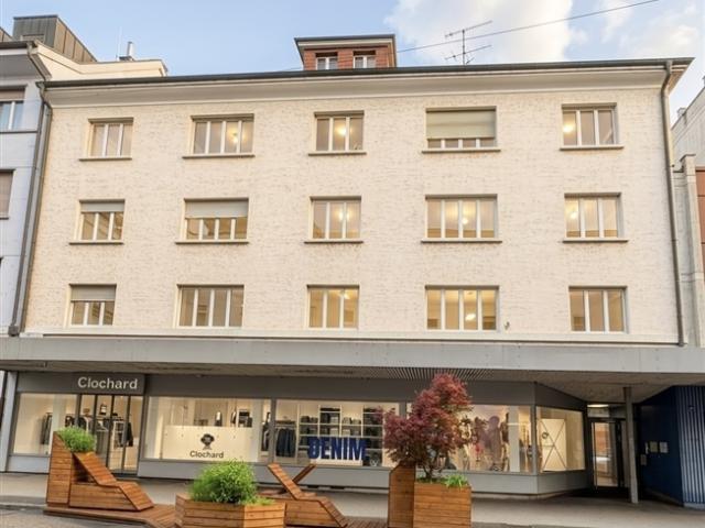 In Delémont zu verkaufen gemischtes Gebäude mit 6 Wohnungen und 1 Geschäft