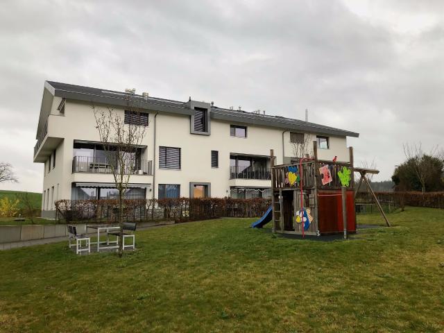 Apartment front & rear view with 3.5 rooms on sale in Châtonnaye 85 m² | dreamo. Ch