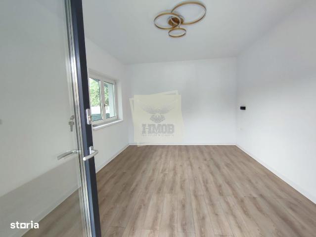 Apartament modern 2 camere 2 bai terasa acoperita si curte in Selimbar