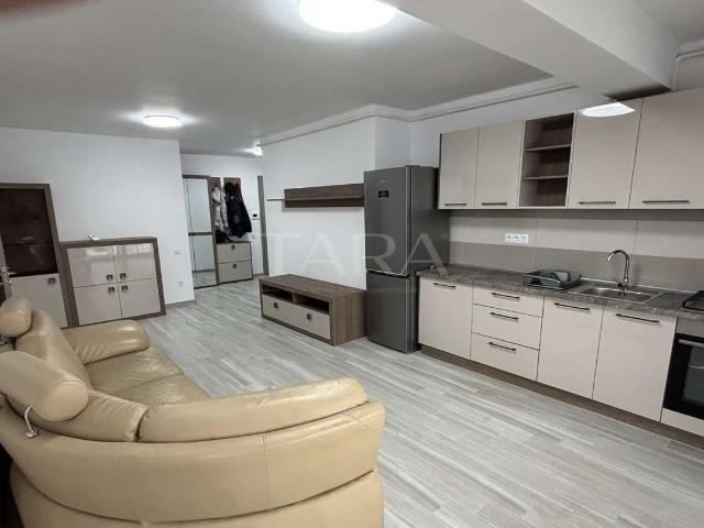 Apartament modern cu 2 camere, terasă generoasă și parcare subterană