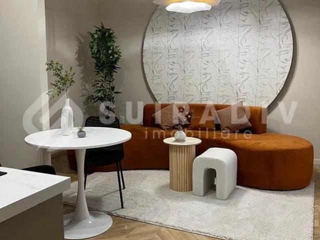 Apartament modern, curte de 20 mp la cateva minute de centru