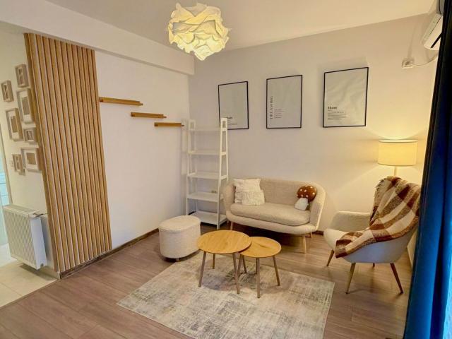 Apartament modern de închiriat, 2 camere, loc de parcare inclus – 400 €
