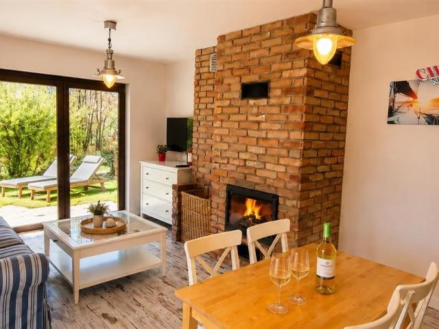 Apartament nad morzem z ogrodem i kominkiem w Gąskach