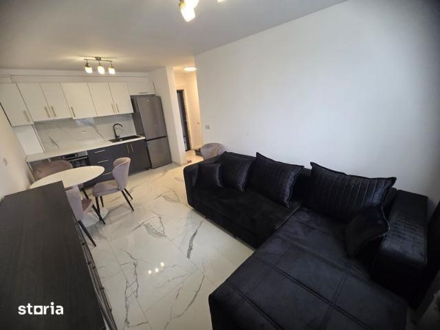 Apartament bloc nou de închiriat cu loc de parcare