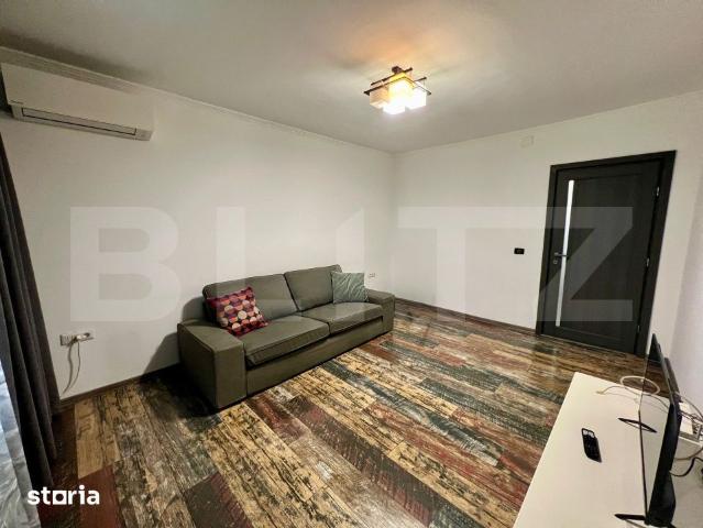 Apartament cu 2 camere, parter, centrala si AC, zona centrala
