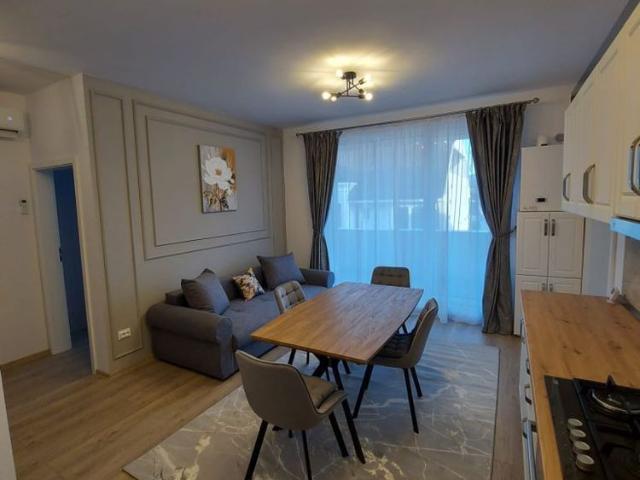 Apartament cu 3 camere,etaj intermediar,parcare subterana,zona Cetati