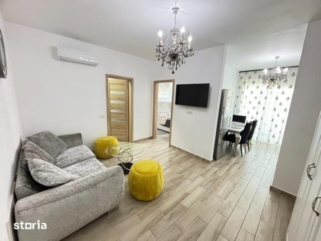 Apartament cu 3 camere, terasa si loc de parcare