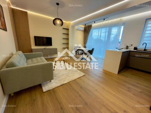 Apartament central finisare premium parcare subterana imobil nou