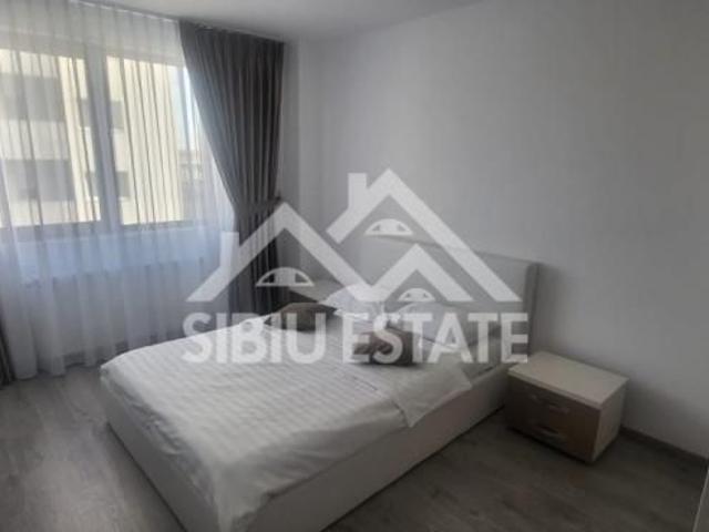 Apartament de inchiriat cu 2 camere, balcon, loc de parcare mobilat si utilat