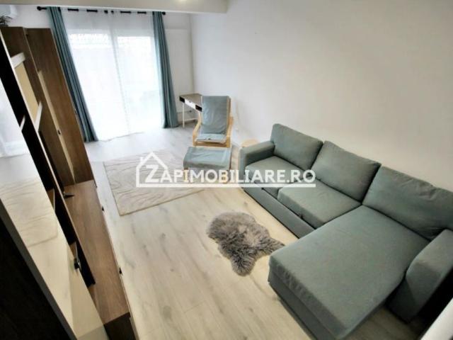 Apartament 1 camera in bloc NOU,46 mp,1 parcare privată