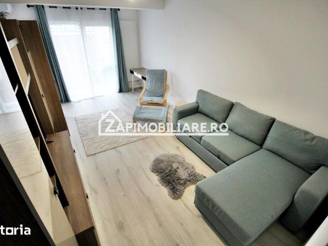 Apartament 1 camera in bloc NOU,46 mp,1 parcare privată