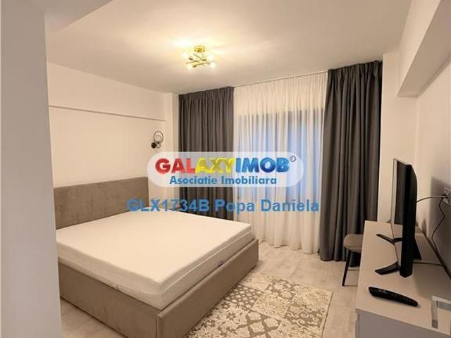 Apartament 2 camere,mobilat lux,parcare supraterana Prima Inchiriere