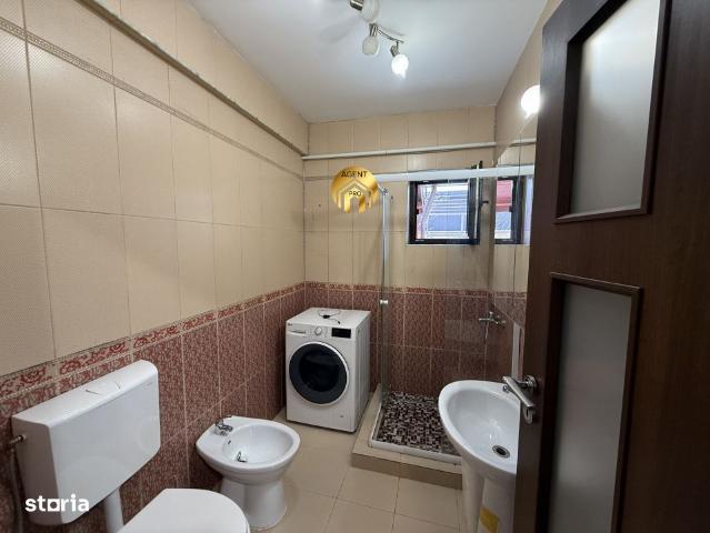 Apartament 2 camere cu curte proprie + 2 locuri de parcare – Strada