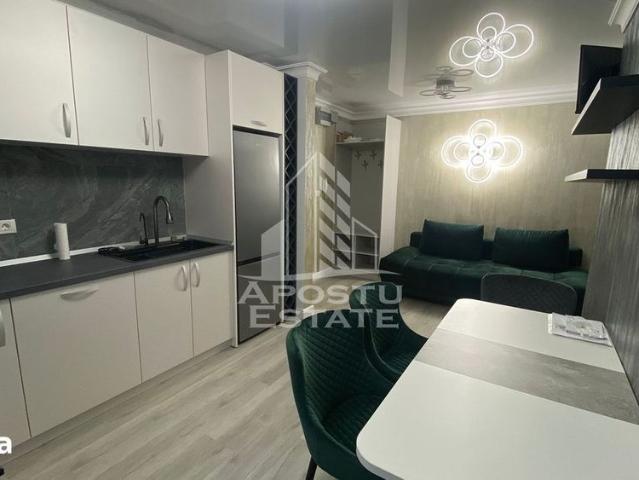 Apartament 2 camere, de închiriat,garaj,centrala proprie, zona Unirii