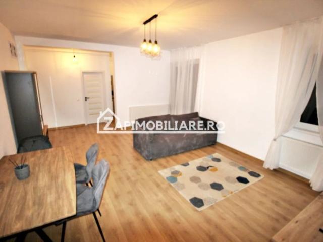 Apartament 2 camere,55mp,1 terasă 50 mp.1 parcare privată