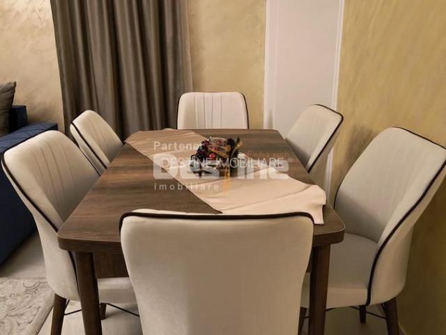 Apartament 3 camere, cu balcon si loc de parcare, situat in cartierul Tractorul