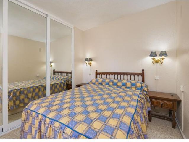 Apartamento 1 dormitorio con vistas laterales al mar y parking comunitario