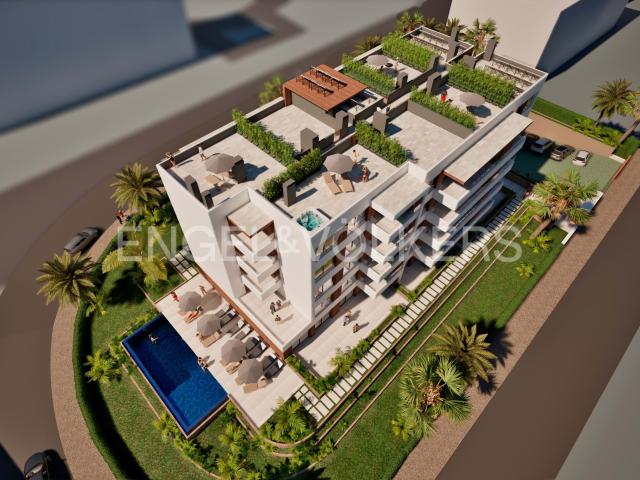 Apartamento T1+1 novo e moderno, perto da praia, com jardim e piscina