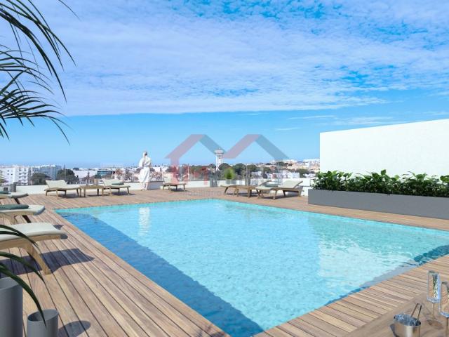 Apartamento novo T1 com piscina e garagem Olhão