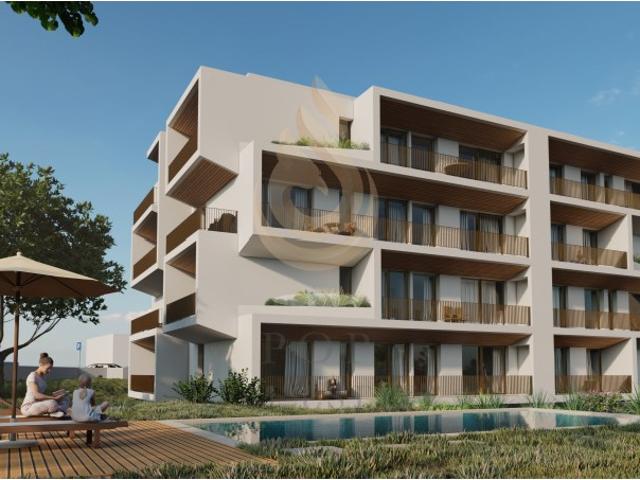 Apartamento T2, com 2 terraços e estacionamento, em condomínio com piscina Gambelas, Faro