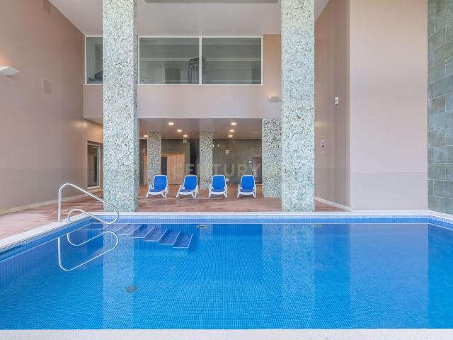 Apartamento T2 condomínio premium com rooftop privado e vista mar em Lagos