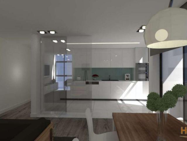 Apartamento T2 Duplex, situado numa zona habitacional, de comércio e serviços. | 26063351054