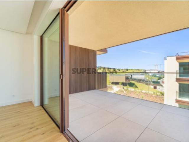 Apartamento T2 novo com varanda vista rio e jardim